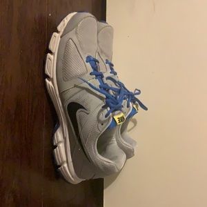 A pair of Nike downshifter5 running shoes